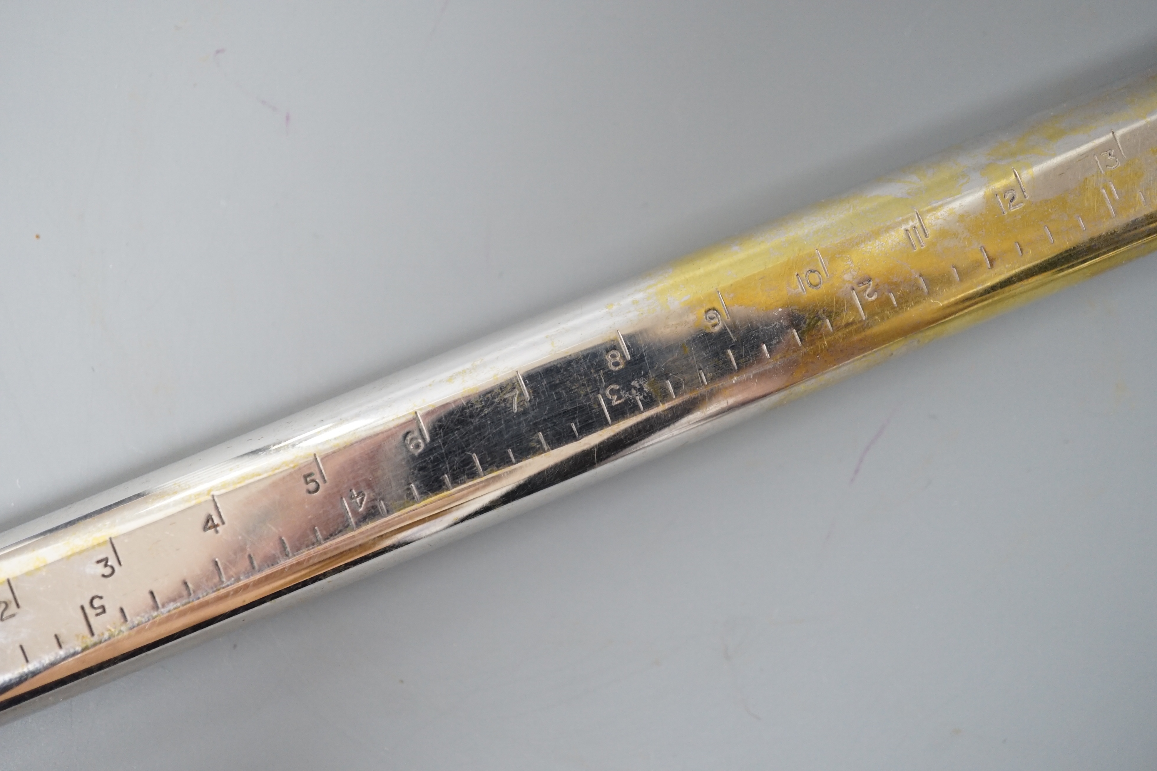 A silver plated novelty Dunhill ‘ruler’ lighter, inscribed by the actress Ann Todd, 16.5 cms long.